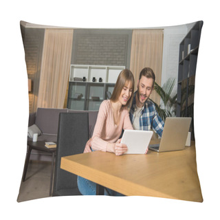 Personality  Happy Couple At Table With Laptop And Digital Tablet In Living Room With Design Interior Pillow Covers