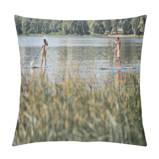Personality  Active Multiethnic Couple In Swimwear Spending Weekend On Water By Sailing On Sup Boards Along Riverside With Green Plants On Blurred Foreground On Summer Day Pillow Covers