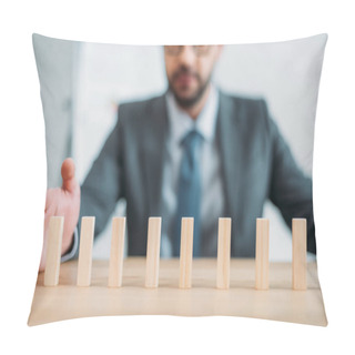 Personality  Close-up Shot Of Businessman Assembling Wooden Blocks In Row On Worktable, Dominoes Effect Concept Pillow Covers