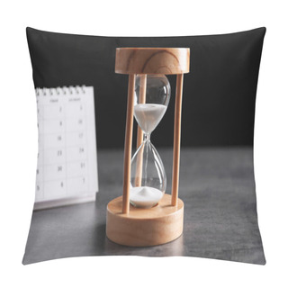 Personality  Hourglass And Calendar On Table Against Black Background. Time Management Pillow Covers