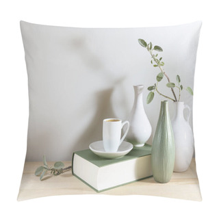 Personality  Still Live Of Three Vases With A Sage Leaf Branch, Gray Green Book And A Coffee Cup On A Wooden Desk Or Table Against A Light Gray Wall, Tranquil Home Decoration, Copy Space, Selected Focus Pillow Covers