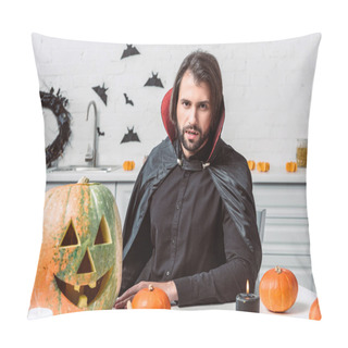 Personality  Portrait Of Man In Vampire Halloween Costume Sitting At Table With Pumpkins In Kitchen At Home Pillow Covers