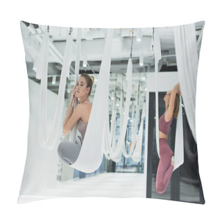 Personality  Young Woman Looking Away While Sitting In Lotus Pose In Aerial Yoga Hammock Pillow Covers