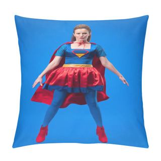 Personality  Beautiful Superwoman In Costume Jumping Isolated On Blue Pillow Covers