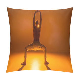 Personality  Back View Of Shirtless Man Practicing Goddess Yoga Pose With Raised Arms On Orange Background  Pillow Covers