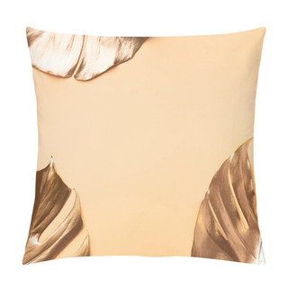 Personality  Floral Minimal Style Concept. Exotic Summer Trend. Golden Tropical Palm Monstera Leaf On Nude Color Background. Shiny And Sparkle Design, Fashion Concept. Pillow Covers