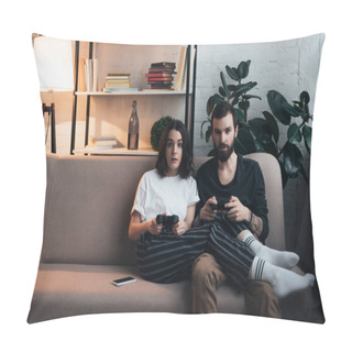 Personality  Beautiful Surprised Young Couple Sitting On Couch With Joysticks And Playing Video Game In Living Room Pillow Covers