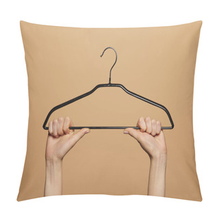 Personality  Cropped View Of Woman Holding Empty Hanger Isolated On Beige Pillow Covers
