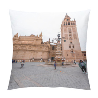 Personality  Seville, Spain-FEB 24, 2022: La Giralda Is The Bell Tower Of Seville Cathedral. It Was Originally Built As The Minaret For The Great Mosque Of Seville During The Reign Of The Almohad Dynasty. Pillow Covers