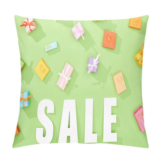 Personality  Top View Of Scattered Decorative Gift Boxes And Shopping Bags On Green Background With Sale Word Pillow Covers