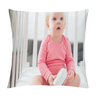 Personality  Selective Focus Of Excited Infant Holding Baby Monitor In Crib  Pillow Covers