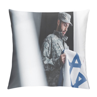 Personality  Selective Focus Of Thoughtful Military Man In Uniform Holding Israel National Flag While Standing By Window Pillow Covers