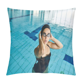 Personality  A Young Female Swimmer In A Black Swimsuit And Goggles Gracefully Gliding Through The Clear Waters Of An Indoor Spa. Pillow Covers