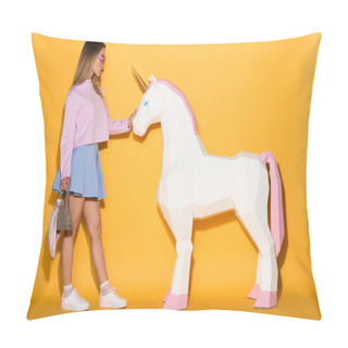 Personality  Side View Of Asian Female Model In Sunglasses Holding Handbag And Touching Decorative Unicorn On Yellow Background  Pillow Covers