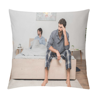Personality  Man Sitting On Bed And Looking Aside After Disagreement With Boyfriend On Blurred Background, Relationship Difficulties Concept Pillow Covers