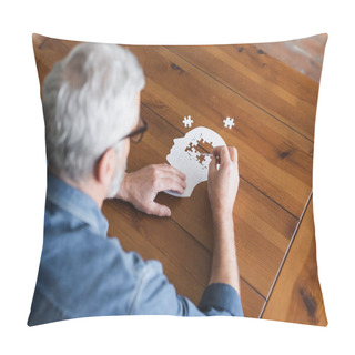 Personality  Overhead View Of Senior Man On Blurred Foreground Folding Puzzle On Table  Pillow Covers