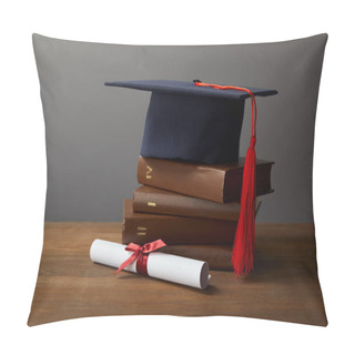 Personality  Diploma, Academic Cap And Books On Wooden Surface On Grey Pillow Covers
