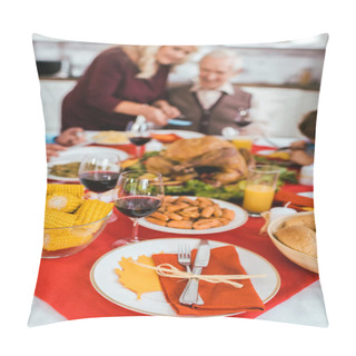 Personality  Thanksgiving Dinner Table With Various Tasty Dishes And Seniour Couple Sitting Blurred On Background Pillow Covers