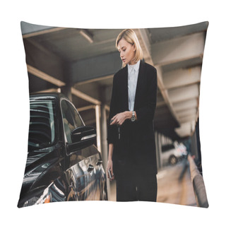 Personality  Beautiful Blonde Woman Holding Key And Standing Near Black Automobile In Parking  Pillow Covers