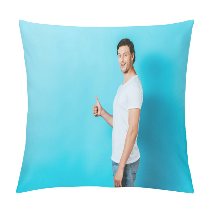 Personality  Side View Of Man In White T-shirt Showing Thumb Up On Blue Background Pillow Covers