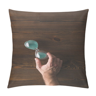 Personality  Partial View Of Man Holding Hourglass In Hand On Wooden Surface Pillow Covers