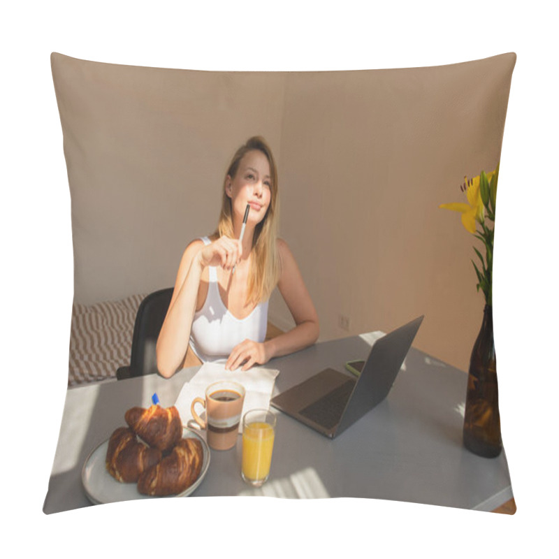 Personality  Pensive freelancer holding pen near breakfast and gadgets at home  pillow covers