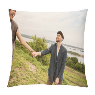 Personality  Cheerful And Stylish Woman In Vest Holding Hand Of Bearded Boyfriend In Newsboy Cap And Jeans With Scenic Nature And Overcast Sky At Background, Fashion-forwards In Countryside Pillow Covers
