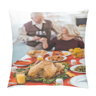 Personality  Various Delicious Food On Table On Foreground With Senior Couple Clinking Glasses Of Wine During Thanksgiving Celeration With Granddaughter Pillow Covers