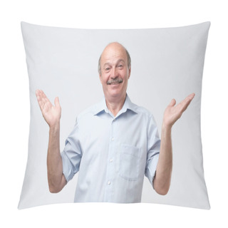 Personality  Indoor Portrait Of Confused Senior Man In Blue Shirt Showing I Have No Idea Gesture, Shrugging Shoulders And Raising Hands, Standing Against Gray Background. Sorry I Did Not Mean It Pillow Covers