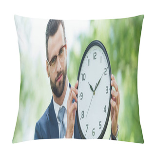 Personality  Panoramic Shot Of Young Man Holding Clock And Looking At Camera Pillow Covers