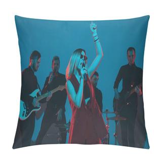 Personality  Young Caucasian Musicians, Band Performing In Neon Light On Blue Studio Background, Singer In Front Pillow Covers