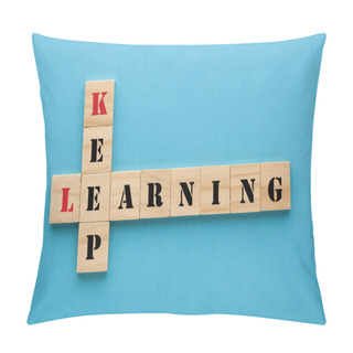 Personality  Words Keep Learning Concept Crossword Clues In Wooden Blocks On Blue Background.  Pillow Covers