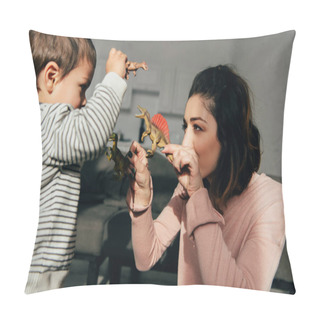 Personality  Selective Focus Of Mother And Little Son Playing Toy Dinosaurs In Living Room At Home Pillow Covers