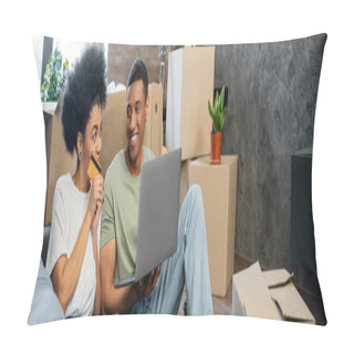 Personality  Positive African American Couple Using Laptop And Credit Card During Relocation In New House, Banner Pillow Covers