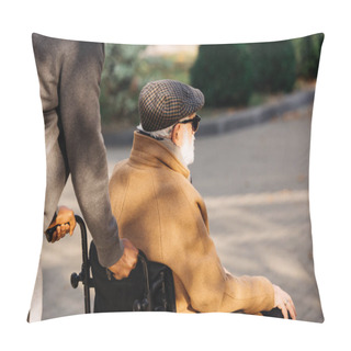 Personality  Cropped Shot Of Senior Disabled Man In Wheelchair And Nurse Riding On Street Pillow Covers