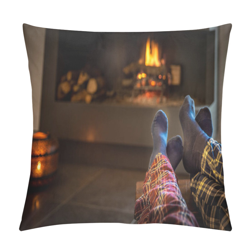 Personality  Couple sitting in front of the fireplace relaxes with the warm fire by warming their feet. Concept of winter holidays, christmas holidays and love on valentines day pillow covers