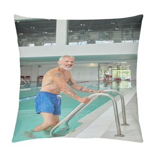 Personality  Happy Mature Man With Tattoos And Beard Standing In Blue Water Near Pool Ladder, Wellness Retreat Pillow Covers