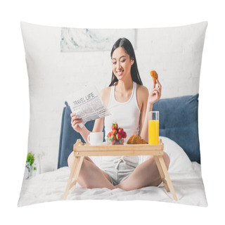 Personality  Selective Focus Of Cheerful Asian Woman Reading Newspaper And Holding Piece Of Croissant On Bed  Pillow Covers
