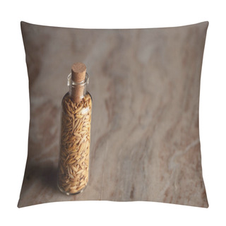 Personality  A Small Glass Bottle Filled With Organic Rice Bran (Oryza Sativa) Or Dhaan Is Placed On A Marble Background. Pillow Covers