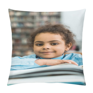 Personality  Selective Focus Of Happy African American Kid Looking At Camera Near Book On Table  Pillow Covers