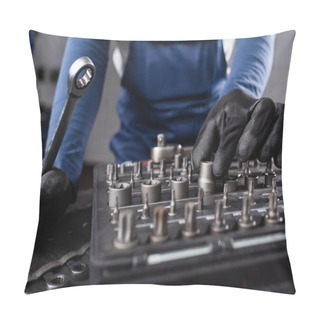 Personality  Cropped View Of Mechanic In Gloves Holding Wrench Near Tools In Garage  Pillow Covers