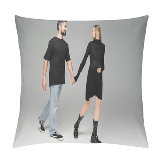 Personality  Full Length Of Smiling Man In Jeans And Black T-shirt Holding Hand Of Stylish Pregnant Wife In Dress And Walking On Grey Background, New Beginnings And Anticipation Concept, Expecting Parents  Pillow Covers