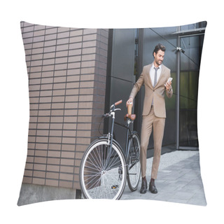 Personality  Full Length Of Smiling Businessman Holding Smartphone And Coffee To Go Near Bicycle While Standing Near Building  Pillow Covers
