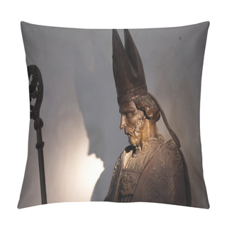 Personality  The Image Shows A Detailed Sculpture Of A Bishop, Captured In A Moment Of Silent Contemplation. The Bishops Regal Attire, Including The Mitre And The Crozier, Is Sculpted With Precision, While The Pillow Covers
