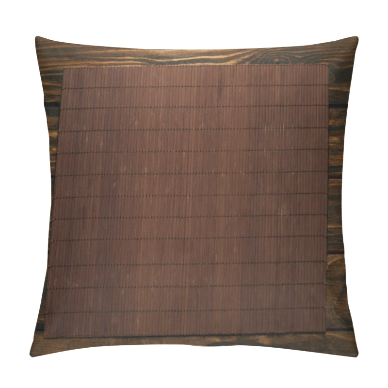 Personality  top view of empty brown bamboo mat on wooden table pillow covers