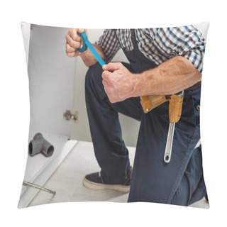 Personality  Cropped View Of Plumber Holding Insulating Tape While Fixing Sink In Kitchen  Pillow Covers