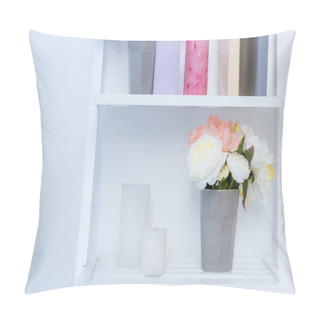 Personality  Close-up View Of White Wooden Shelves With Books, Candles And Flowers In Vase Pillow Covers