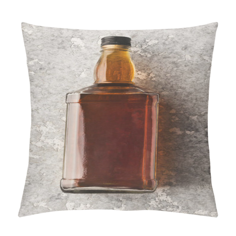 Personality  Blank bottle with whiskey or cognac on stone background pillow covers