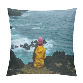 Personality  Rear View Of Woman In Yellow Raincoat Sitting On Cliff In Front Of Ocean, Iceland Pillow Covers