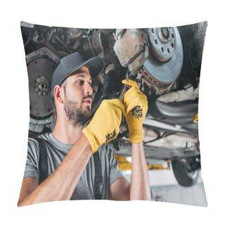 Personality  Professional Mechanic In Uniform Repairing Car Without Wheel In Workshop Pillow Covers